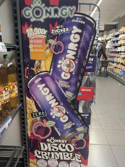 a photo from inside an Edeka of a very colorful and well designed fusion of an advertisment board and a cardboard shelf