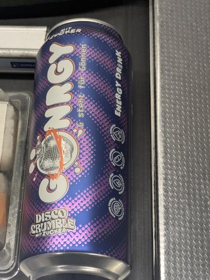 the disco crumble Gönrgy with sugar on the checkout conveyer belt